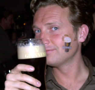 Jonathan Holburn enjoys his Guinness