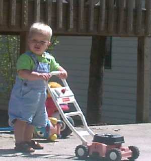 little max rusin mows the pavement